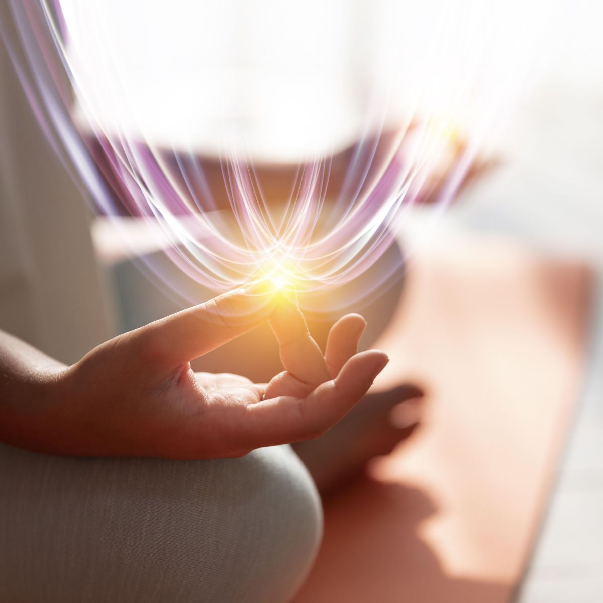 Person journaling in morning light, symbolizing emotional harmony and soft energy