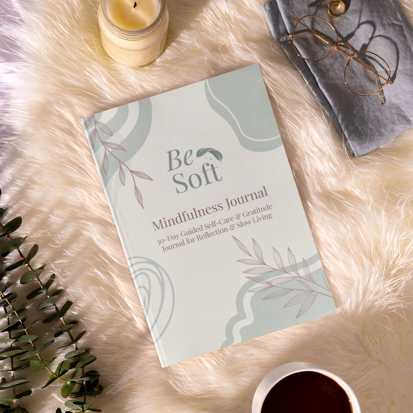Be Soft Mindfulness Journal on a marble table beside coffee and croissant, a ritual for gratitude and inner calm